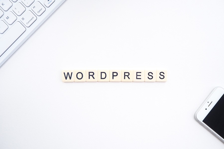 WordPress, written with scrabble pieces